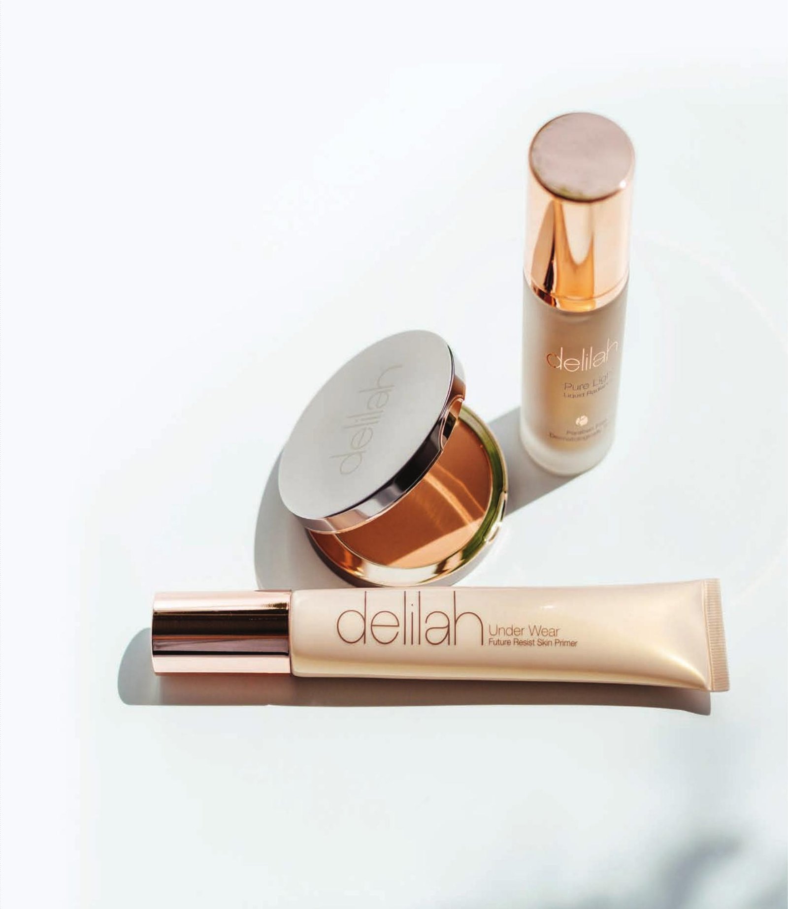 Productos Delilah: Pure Light Liquid Radiance, polvo compacto y Under Wear